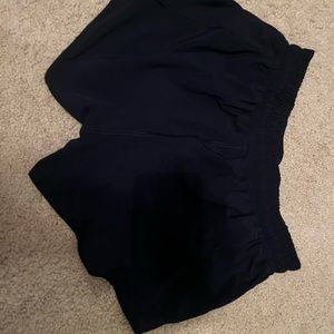 Lululemon size 8 navy blue hotty hot shorts